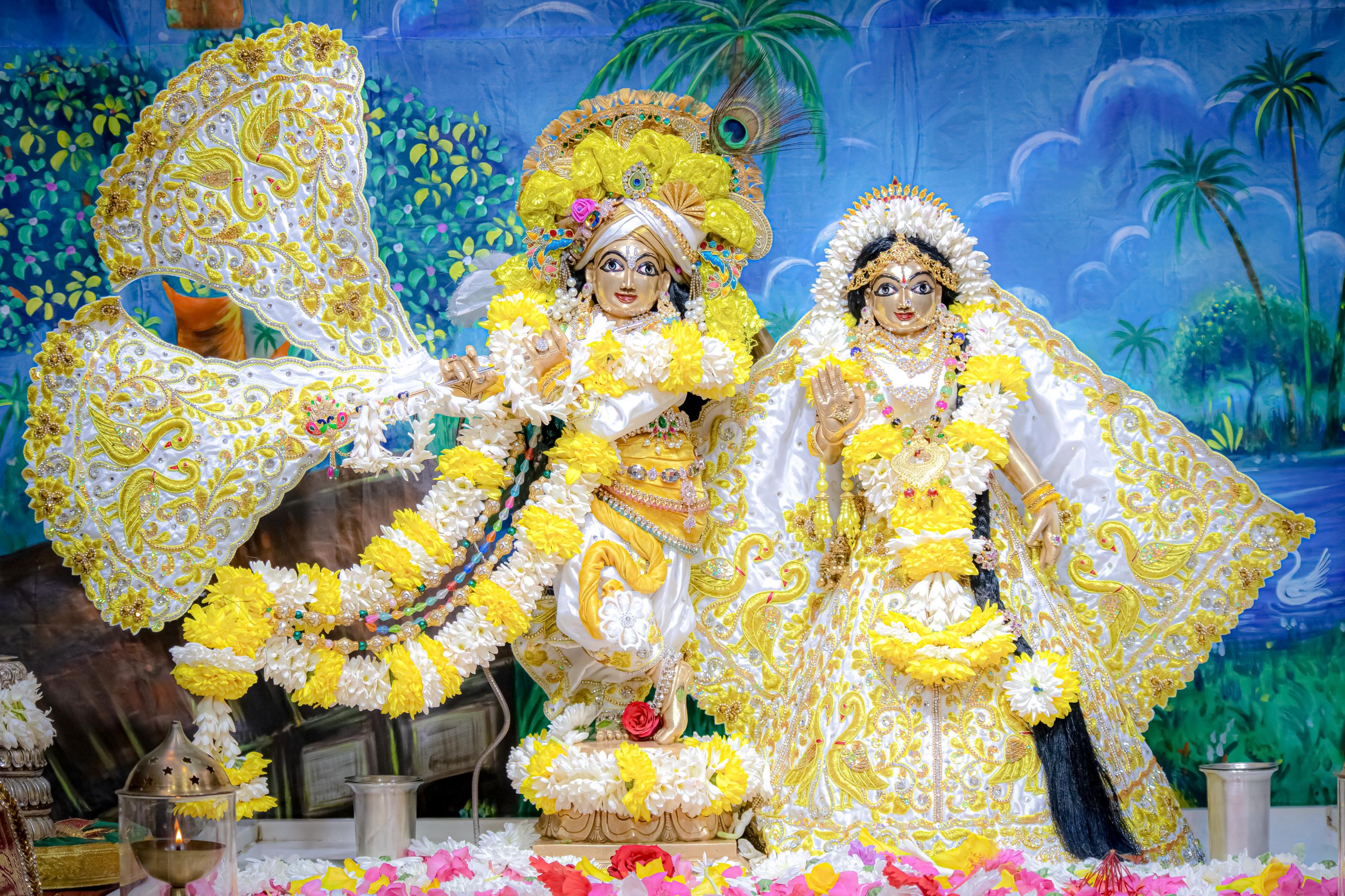 Sri Sri Radha Gokulananda adorned with flowers and ornaments